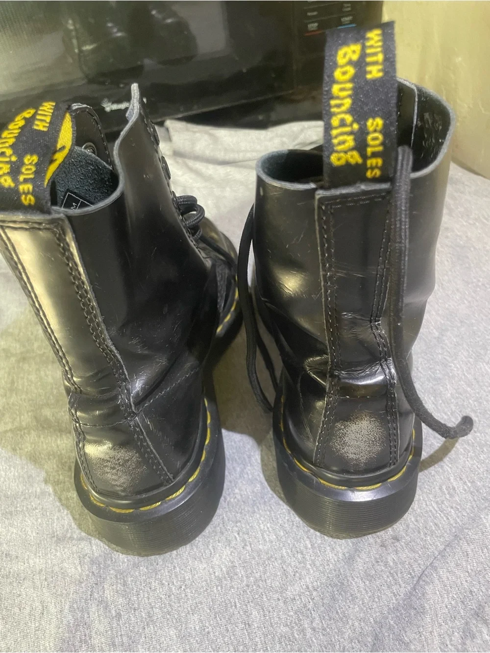 Dr. Martens Black Leather Lace-Up Boots with Yellow Stitching